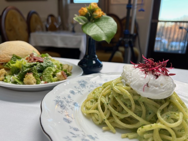 Manna - Peruvian spinach pesto sauce tossed with a nest of homemade spaghetti